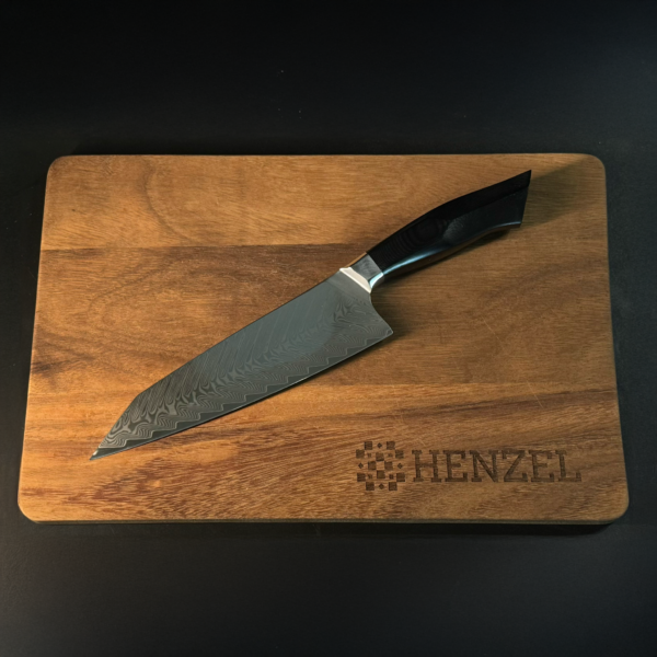 Damascus Steel Luxury Chef Knife on Wooden Cutting Board by Henzel