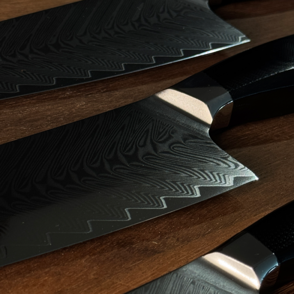 Detailed View of Henzel Damascus Steel Knife Blades with Unique Damascus Patterns