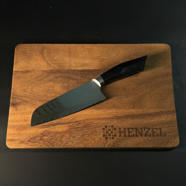 Santoku Knife on Wooden Cutting Board Damascus Steel Knife by Henzel