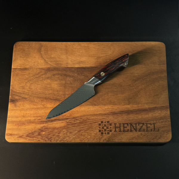 Utility Knife from Henzel Damascus Steel Set on Wooden Cutting Board