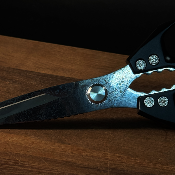 Close-up of Henzel Kitchen Shears with Unique Damascus Steel Patterns