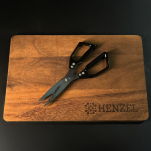 Henzel Kitchen Shears from 110 Layers Damascus Steel on Wooden Cutting Board